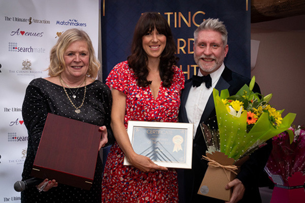 Left to right, Lyn, Hayley the matchmaker of the year holding her award and Andrew